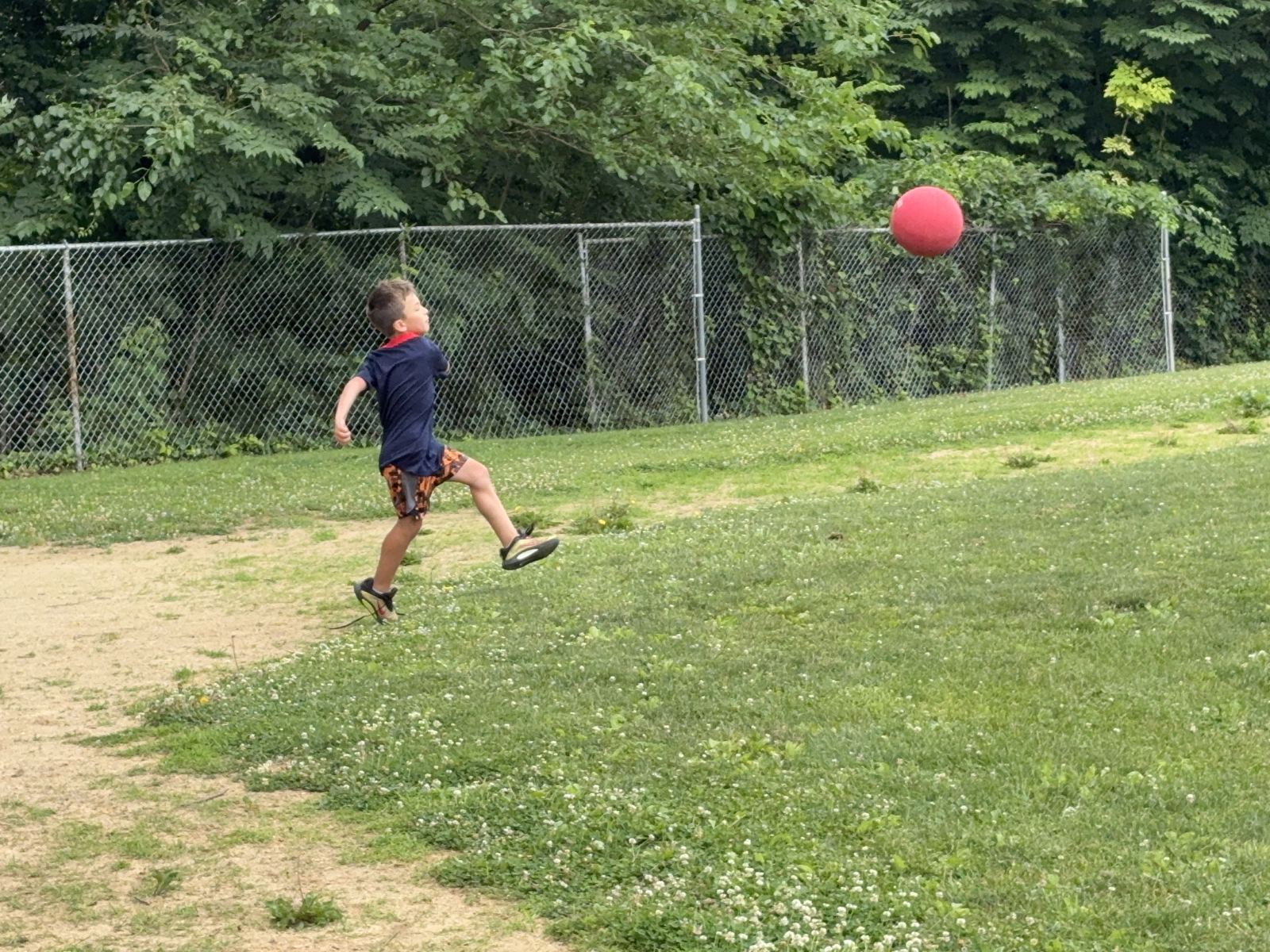 Boy Logan making his kickball debut
