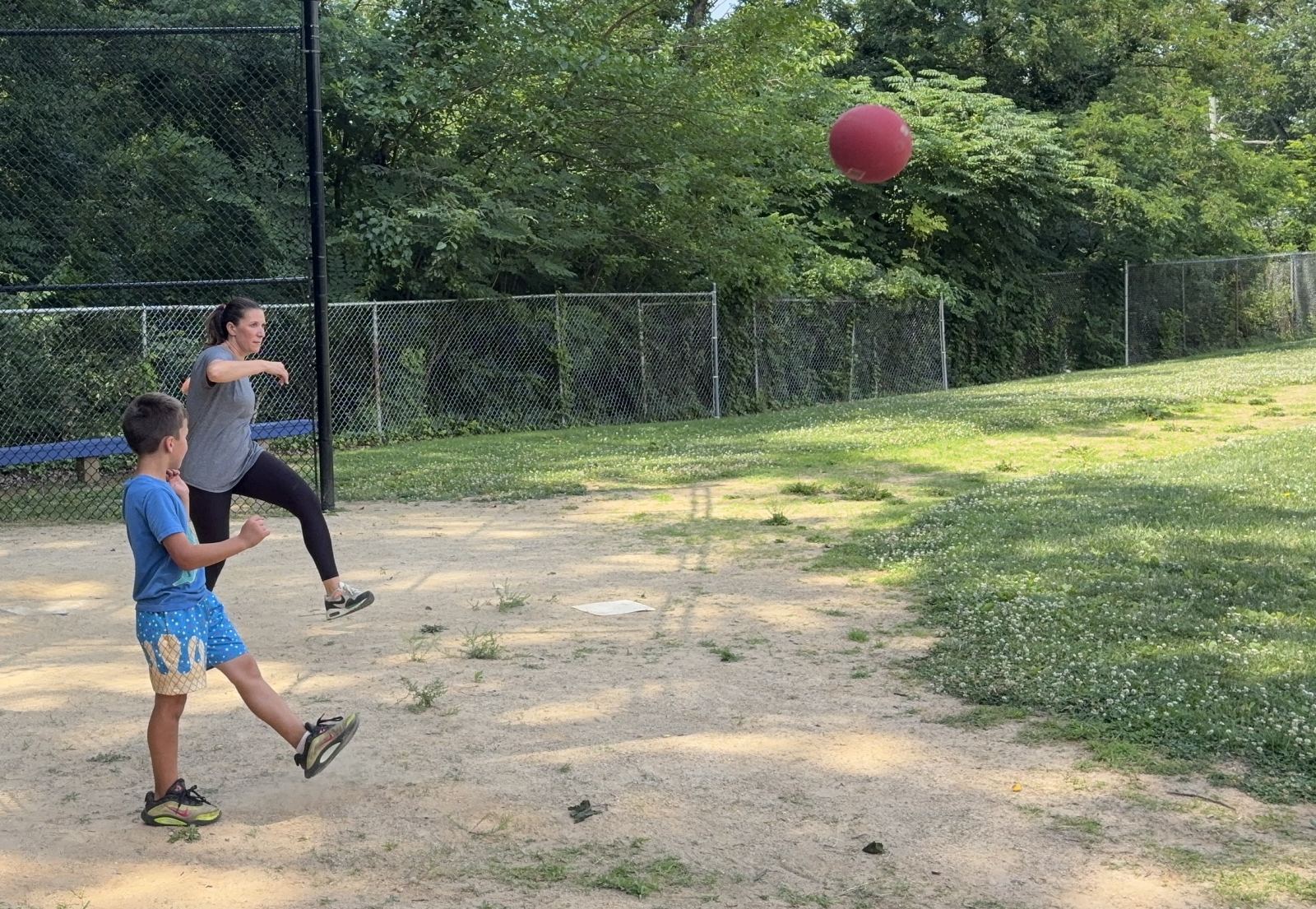 Logan coaching his mom on how to kick