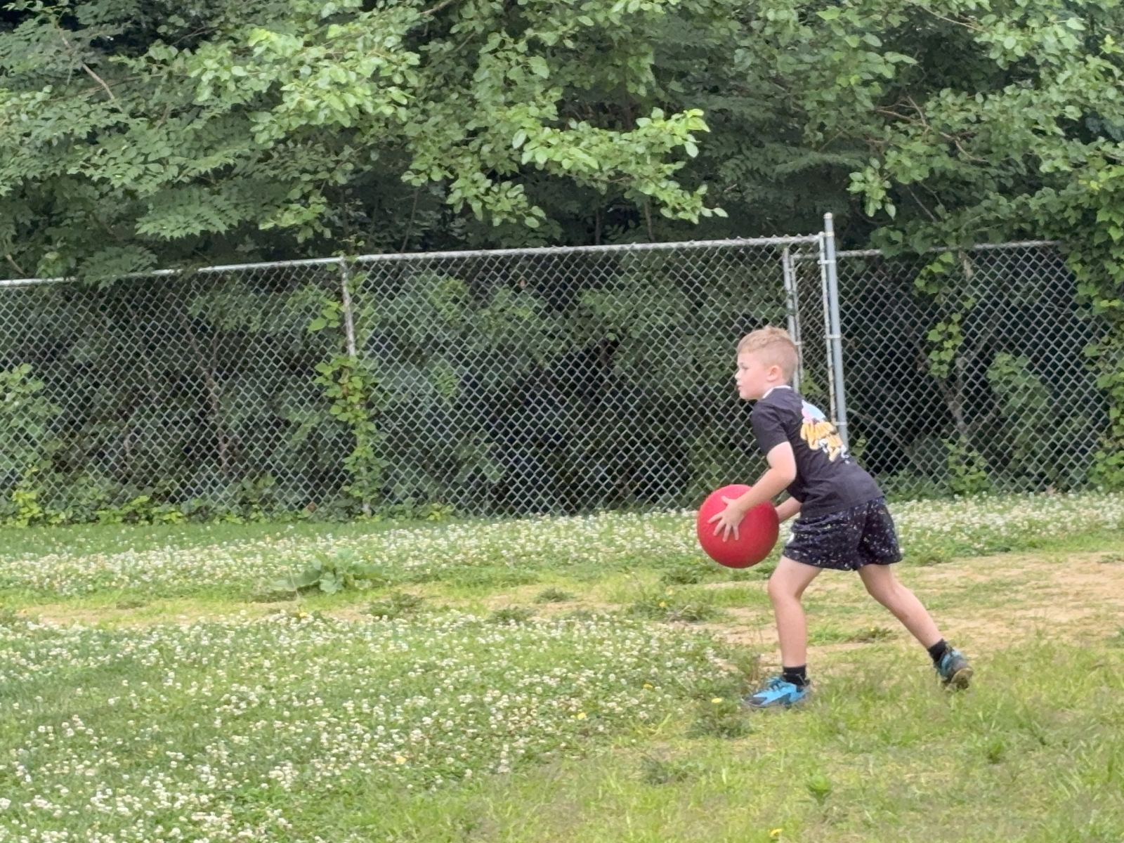 Kason checking the runner back to the base