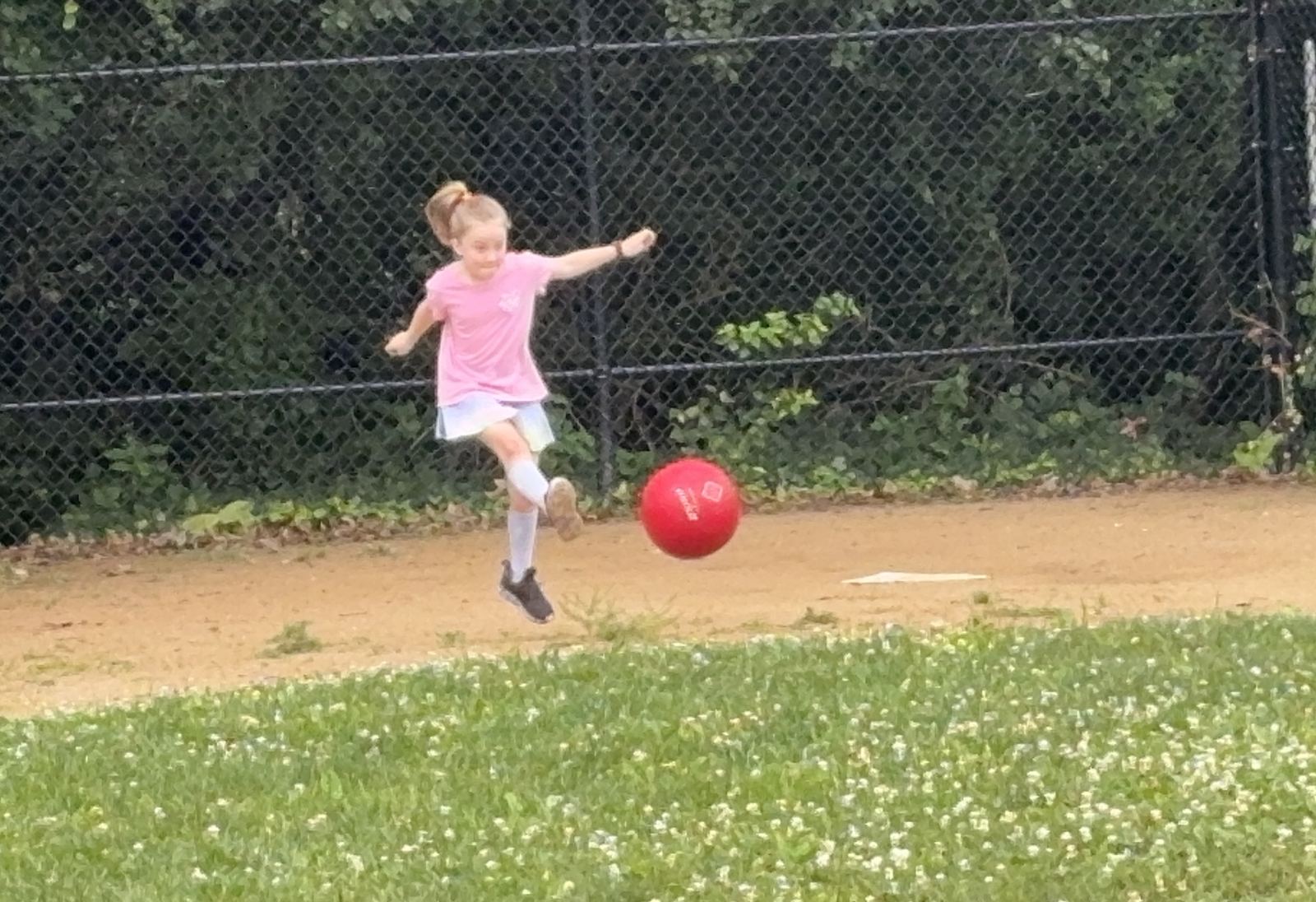 Logan was back on the kickball diamond