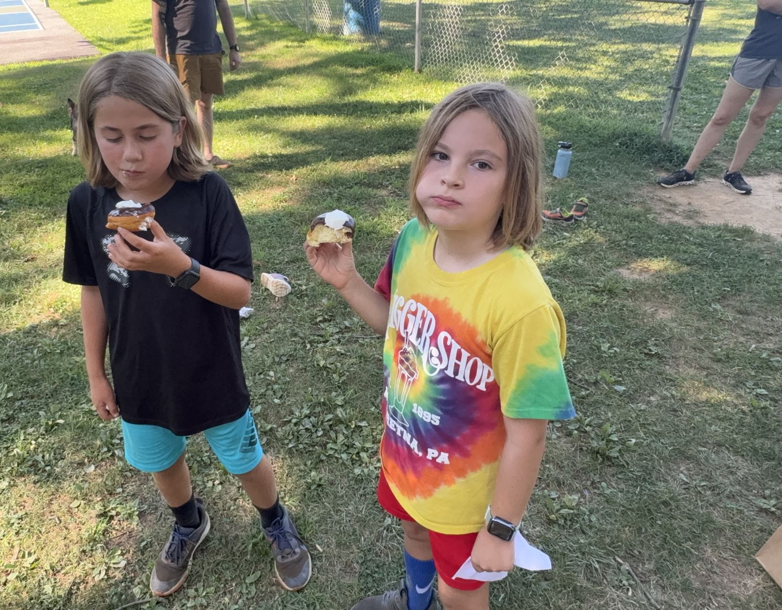 The birthday boy and Griffin sharing donut stories