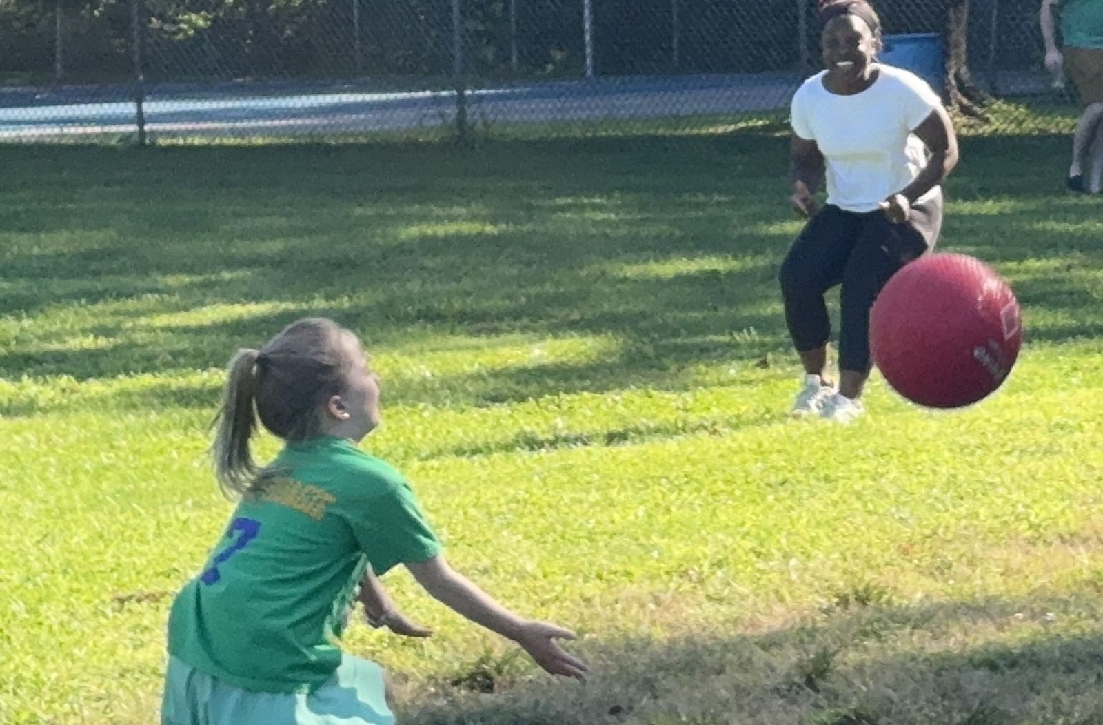 Logan going for the catch as Finda watches on