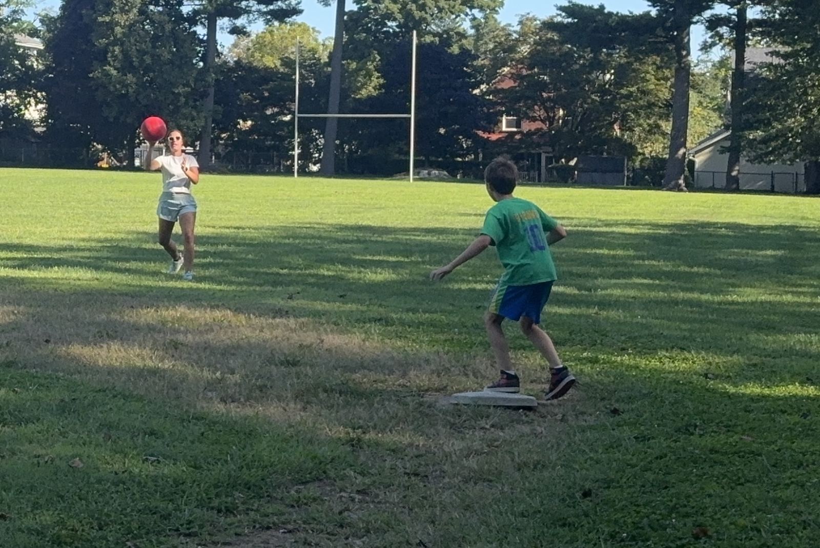 Melinda trying to throw someone out from the outfield