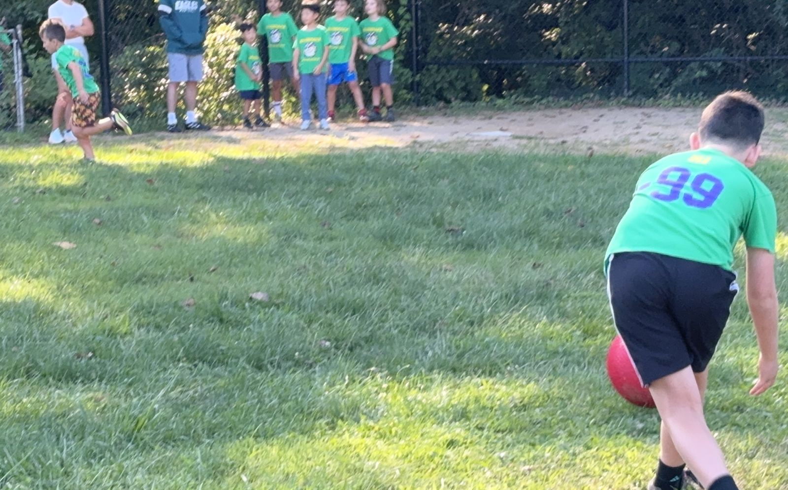 Brother kicks to brother in the field. The race is on